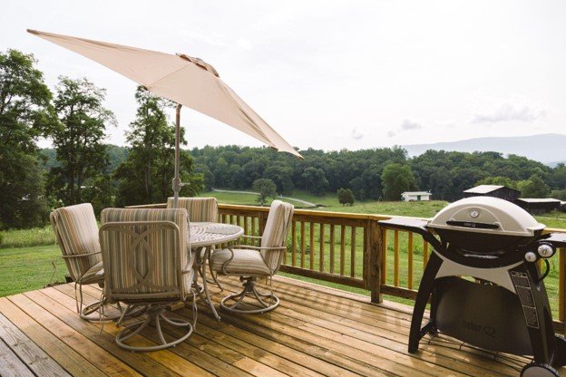 An beautiful out door view with a stylish design of patio decks.